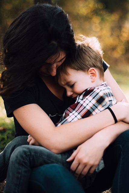 mother hugging child