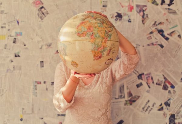 woman holding globe