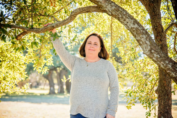 dani wade under a tree limb