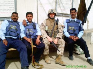 military member deployed with iraqi service members