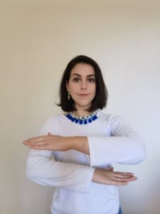 women standing with equality sign