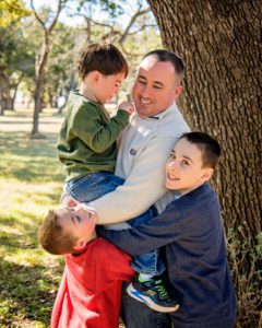 Dad with three sons