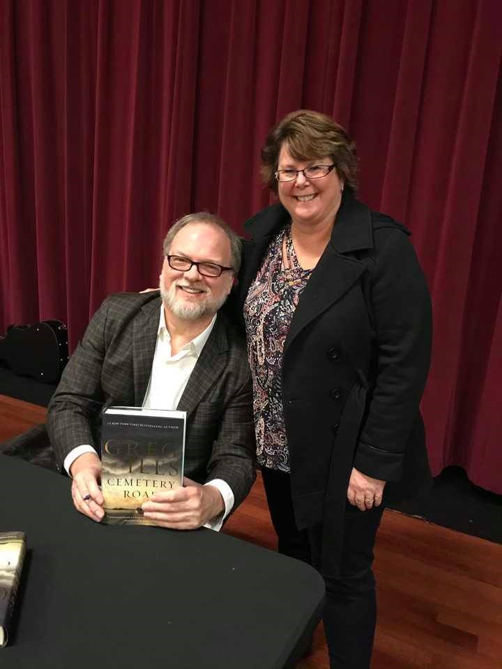 Jen Dodrill with Greg Iles with book