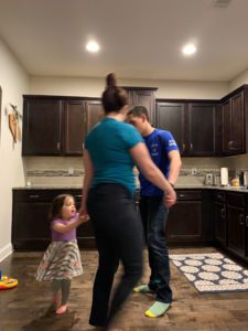 dancing in the kitchen of our house