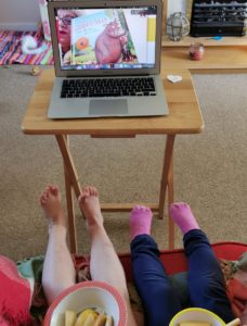 children watching show on laptop