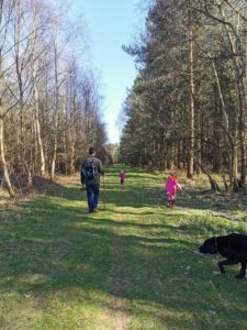 family exploring nature outdoors