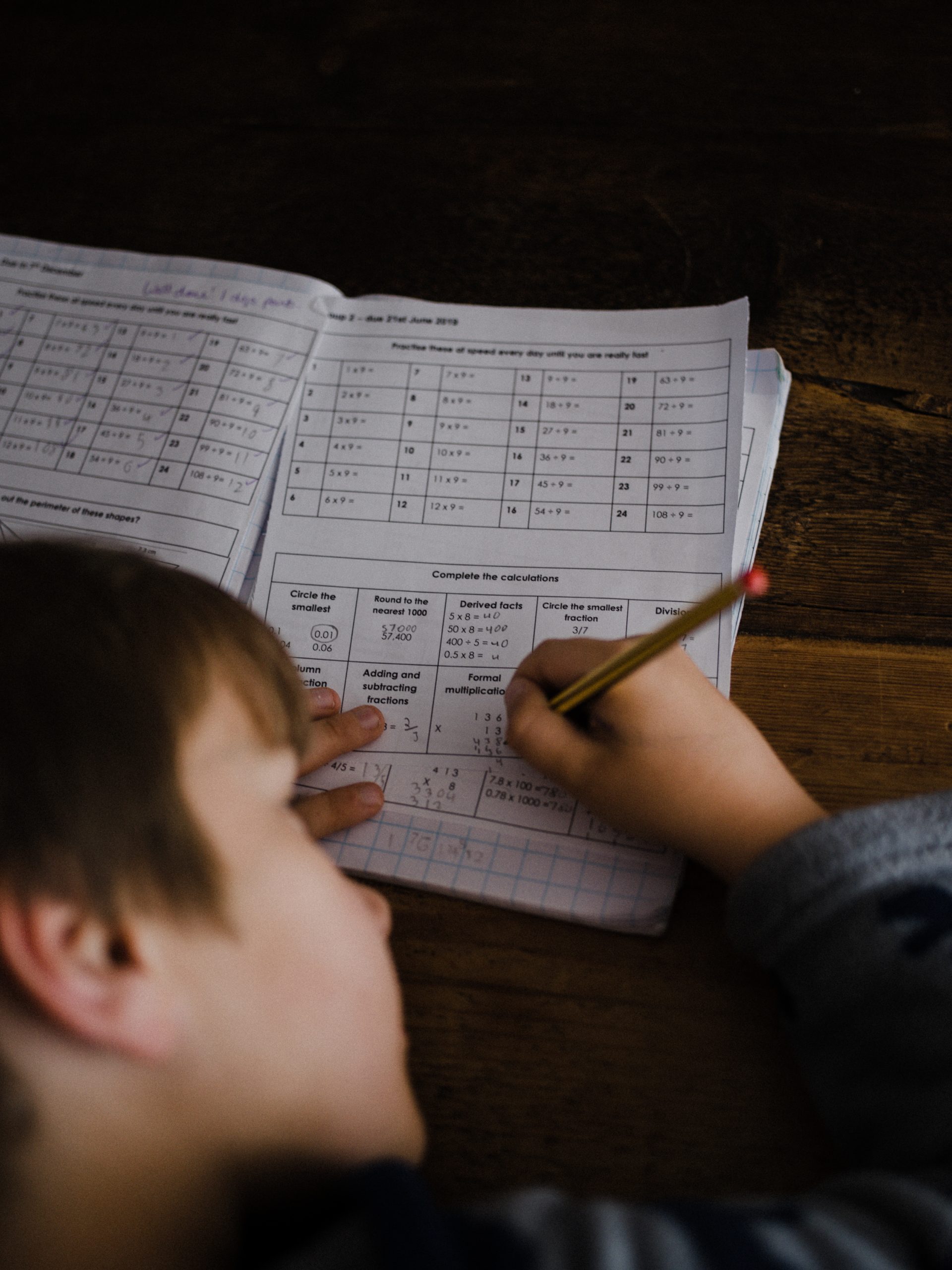 child doing schoolwork at home