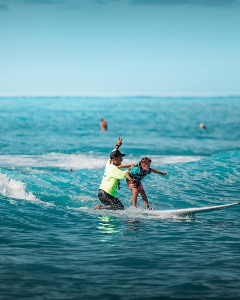 Surfing boy