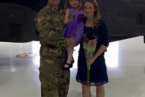 military couple with child