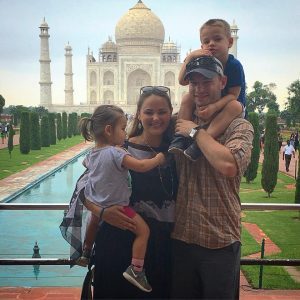 family in front of the Taj Mahal