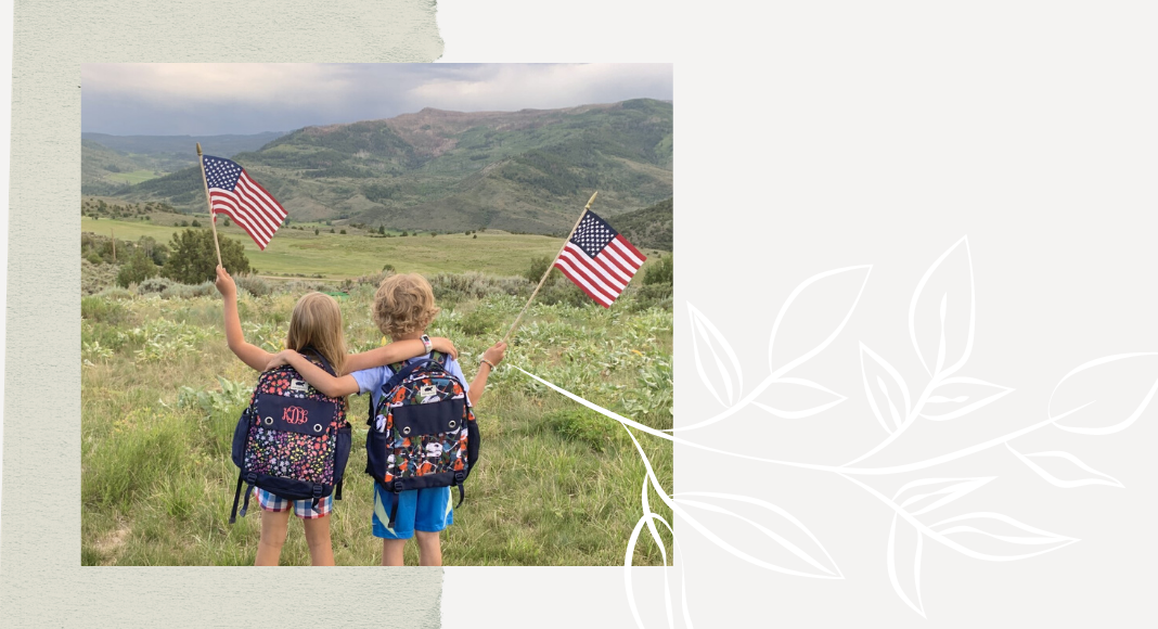 Wanderwild backpacks on kids with flags