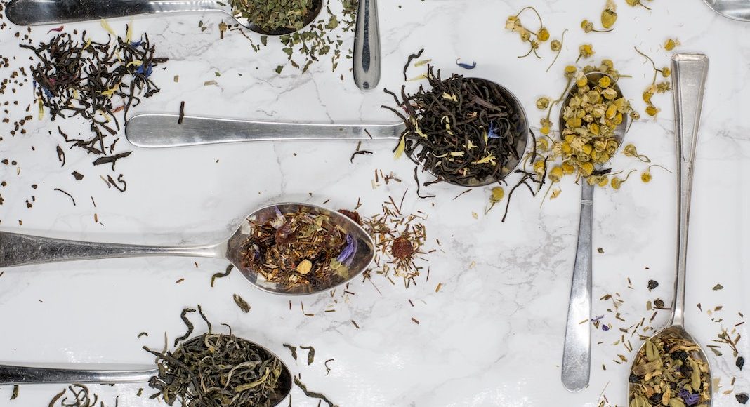 loose-leaf tea on spoons