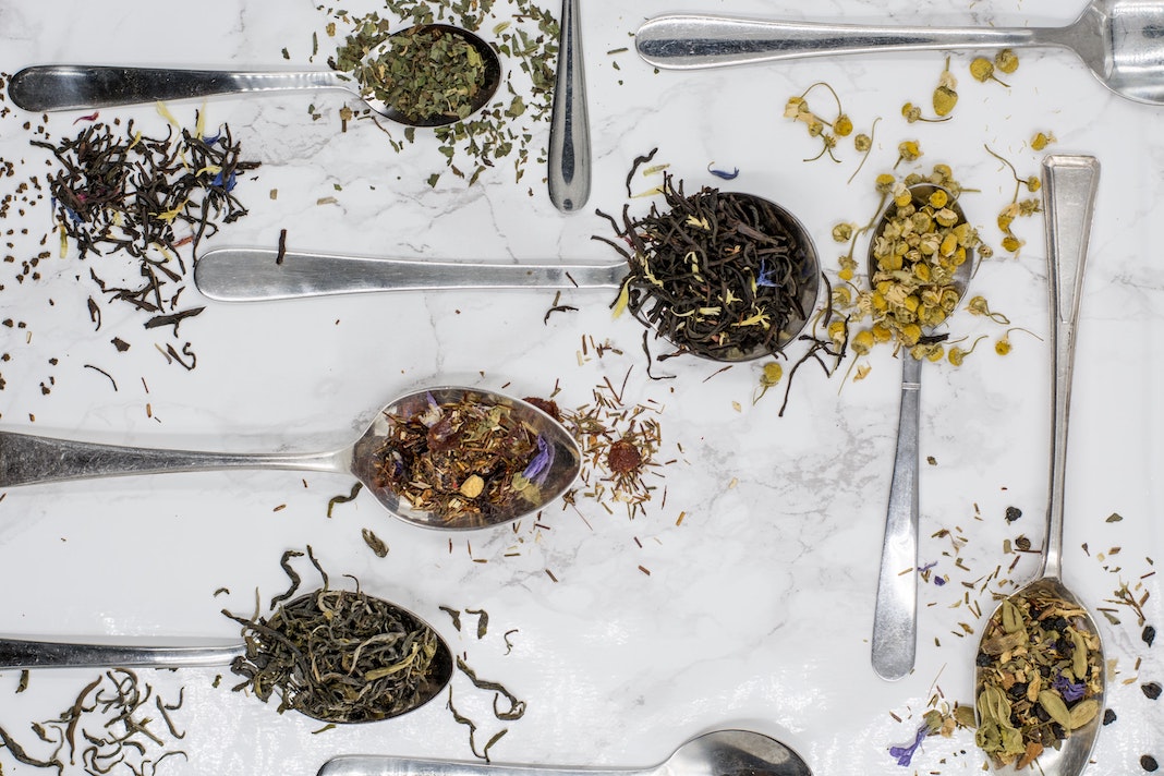 loose-leaf tea on spoons