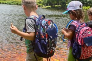 kids wearing Wanderwild backpacks