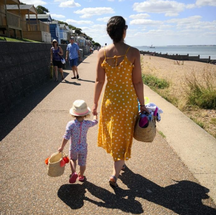 mother and daughter walking