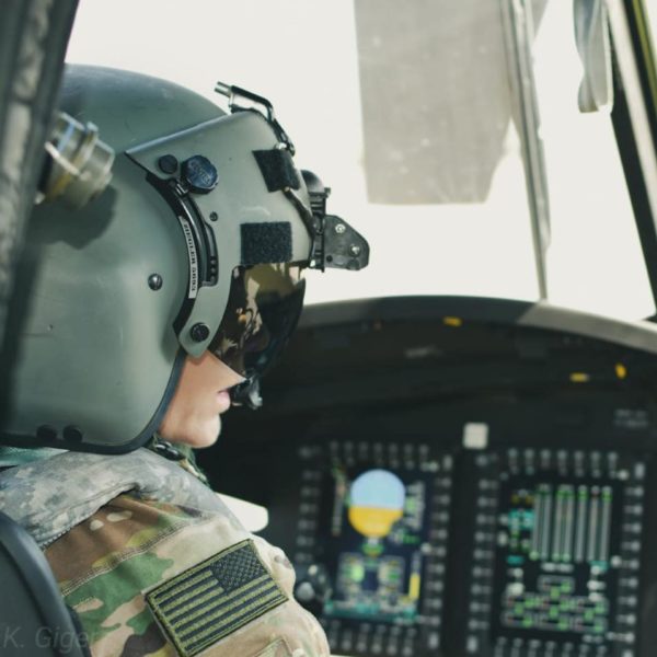 Woman flying military helicopter