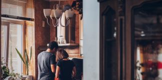 Beyond Netflix: Fresh Ideas for Date Night In couple cooking in their kitchen