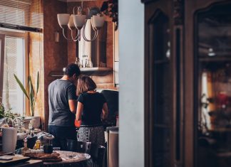 couple cooking in their kitchen