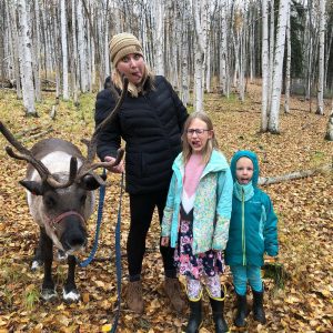 family with a reindeer