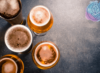 beer in glasses on granite