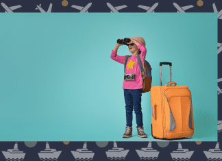 kid with suitcase and binoculars