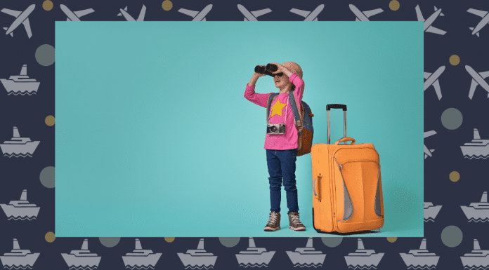 kid with suitcase and binoculars