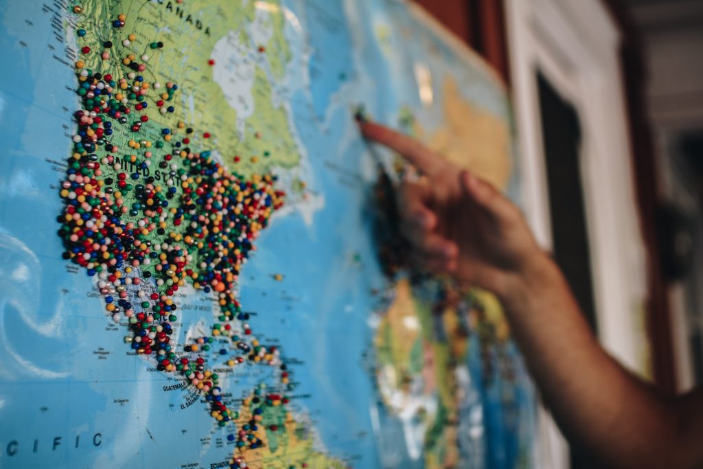 world map with pins