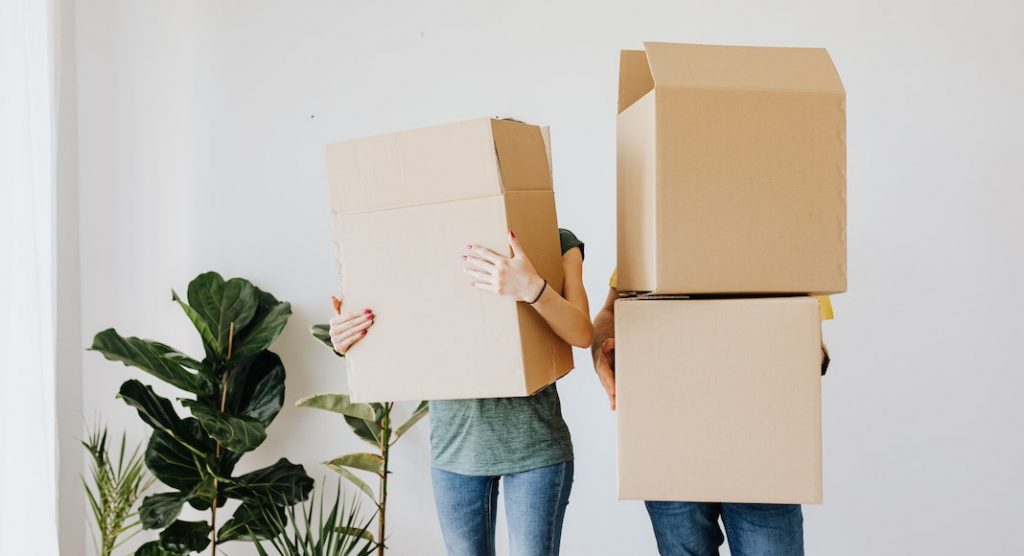 couple with moving boxes