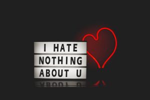 I hate nothing about you on letter board with heart