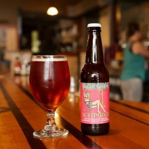 soft parade craft beer bottle and glass