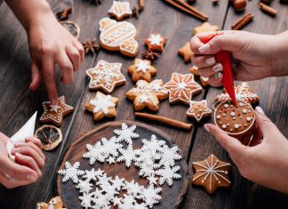 family making christmas cookies