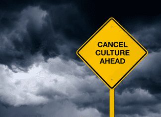 stormy background with "Cancel Culture Ahead" sign