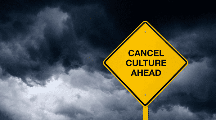 stormy background with "Cancel Culture Ahead" sign