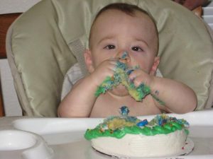 Baby eating smash cake