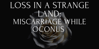 Loss in a Strange Land: Miscarriage While OCONUS loss in a strange land with white rose on black background