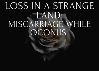 loss in a strange land with white rose on black background