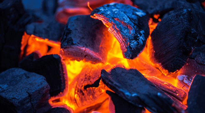 smoldering charcoal briquets