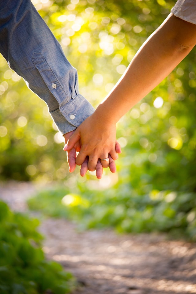 couple holding hands