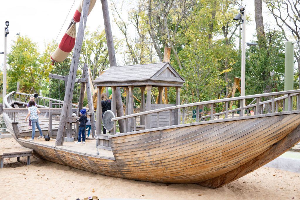 a wooden boat playground