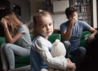 married couple with unhappy child