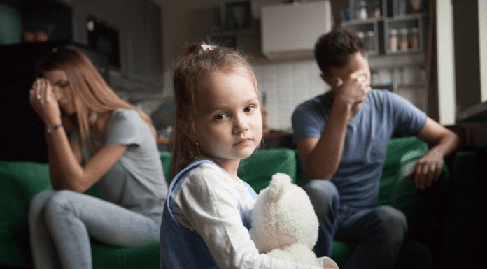 married couple with unhappy child