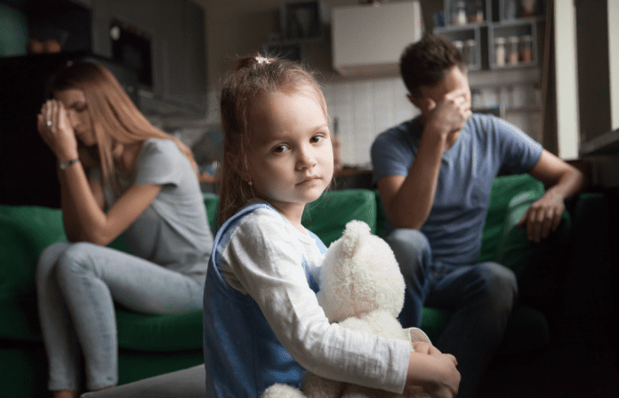 married couple with unhappy child