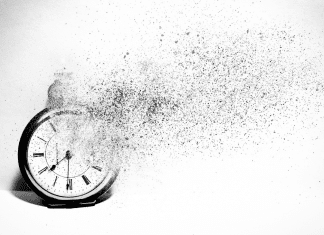 clock disintegrating to symbolize losing time