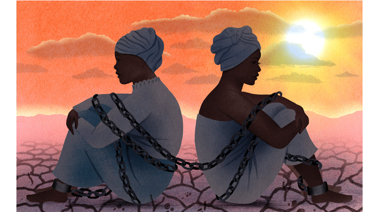 two African women in chains on a dry clay land