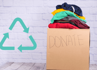 white chalk background with donation box of clothes and recycle symbol