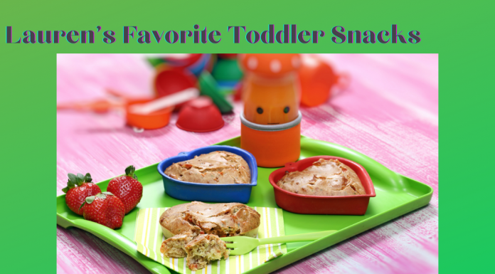 Lauren's Favorite Toddler Snacks with fruit and snacks on a green tray