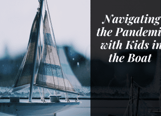 Boat on the water with "Navigating the pandemic with kids in the boat" in quotes