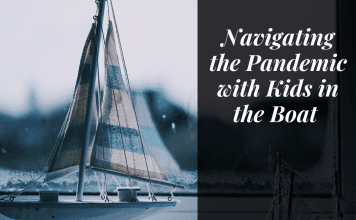 Boat on the water with "Navigating the pandemic with kids in the boat" in quotes