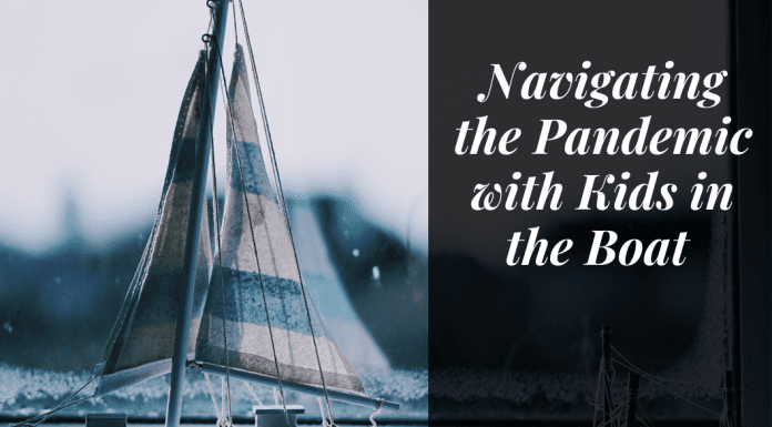 Boat on the water with "Navigating the pandemic with kids in the boat" in quotes