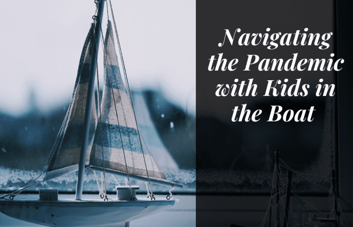 Boat on the water with "Navigating the pandemic with kids in the boat" in quotes